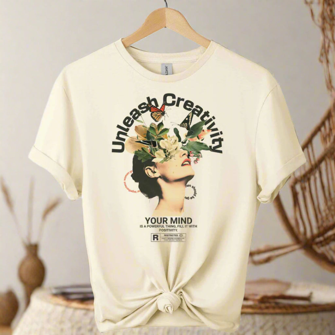 Unisex t-shirt boho style front with typography and graphic design unleash creativity motivational inspired color natural