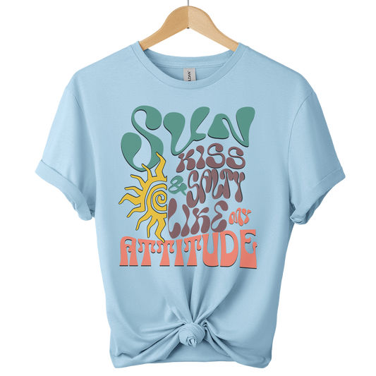 hanging Light blue t-shirt with colorful graphic design on a white background