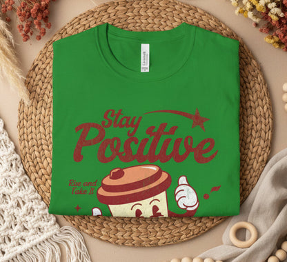 Irish Green t-shirt with 'Stay Positive' and a cup design on a white background