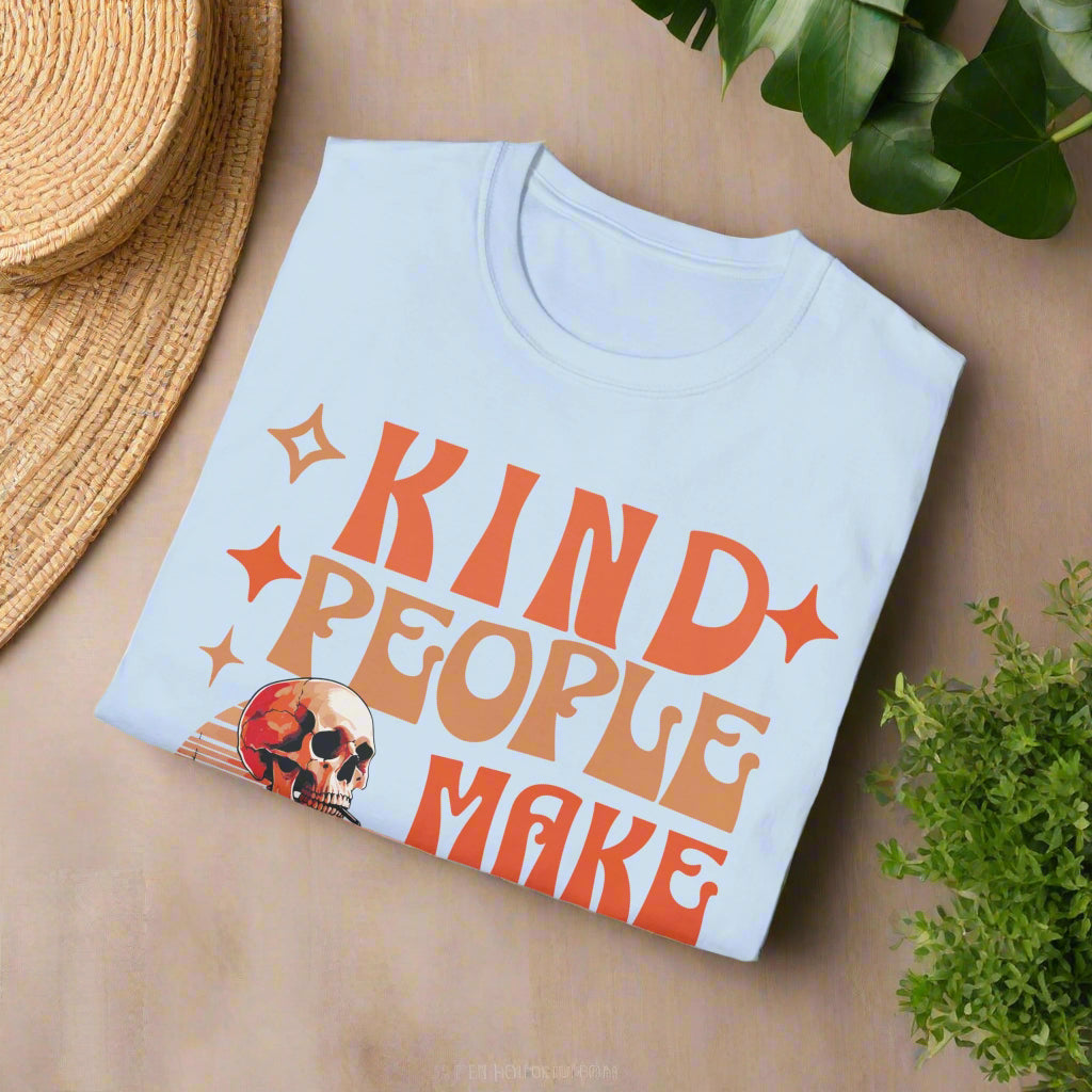 Light blue t-shirt with orange text 'KIND PEOPLE MAKE' on a white background