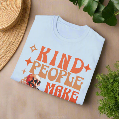 Light blue t-shirt with orange text 'KIND PEOPLE MAKE' on a white background