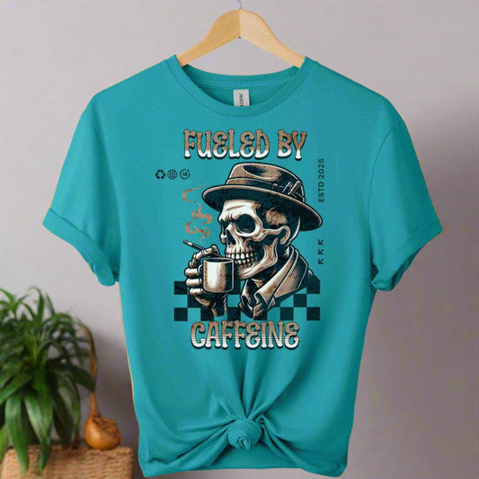 Caffeine T-Shirt with Retro Graphic Design skull drinking coffee front view color and typography fuelled by caffeine color  tropical blue  