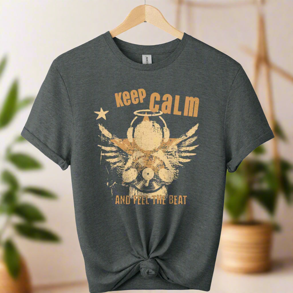 Unisex t shirts color dark heather front design typography "Keep calm" and feel the beat and angel with holding classic vinyl tape. 