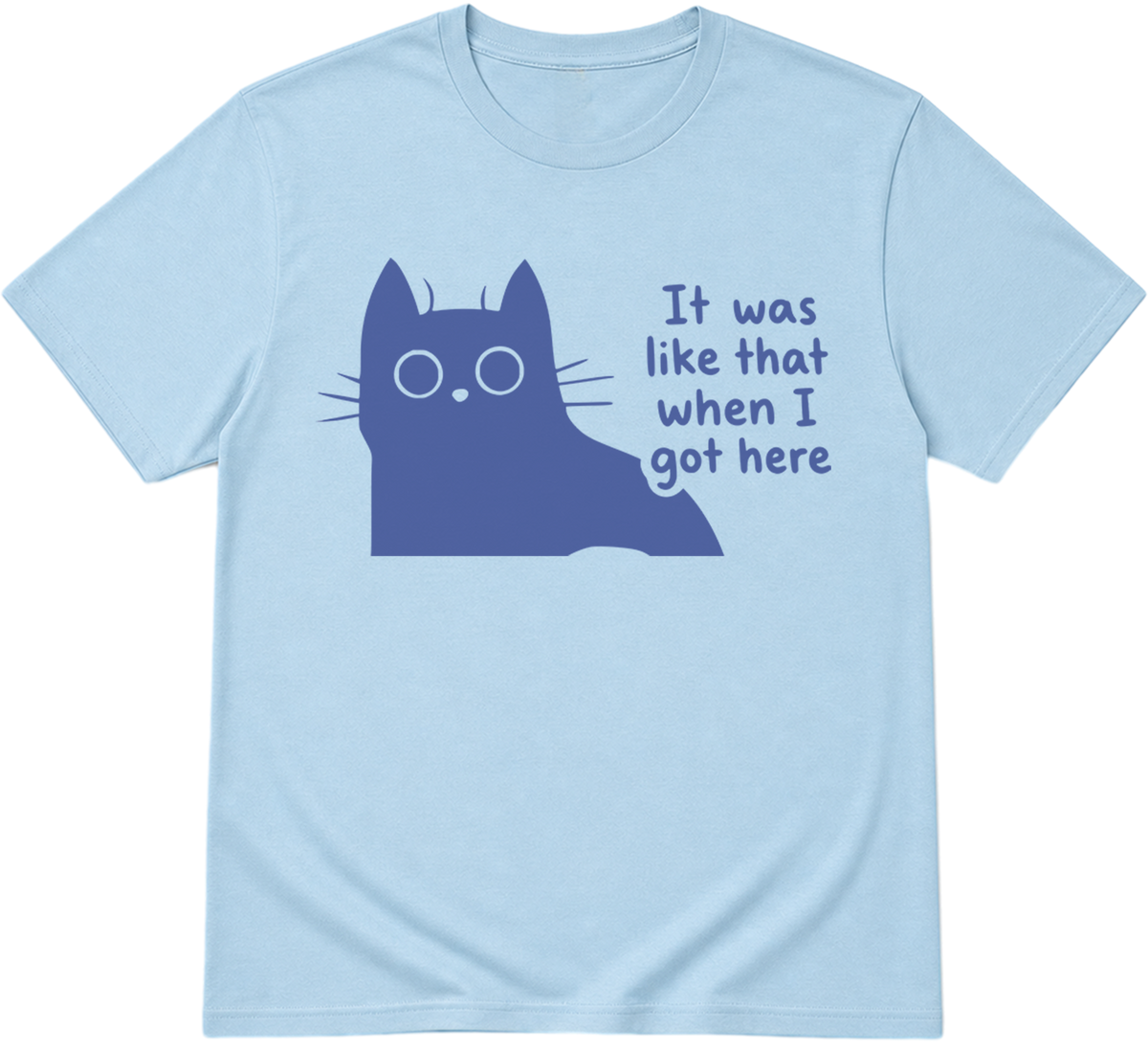 A light blue crewneck t-shirt featuring a dark blue graphic of a cat peeking out from behind with the text 'It was like that when I got here' printed next to it.