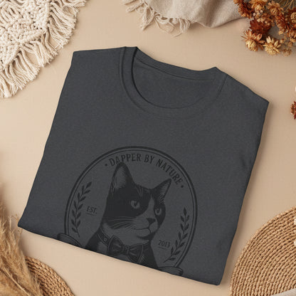 Folded dark gray t-shirt with a graphic of a cat tshirt, 