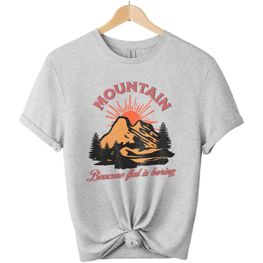 T-shirts boho style with front design mountain graphic and typography "because flat is boring " color sports grey