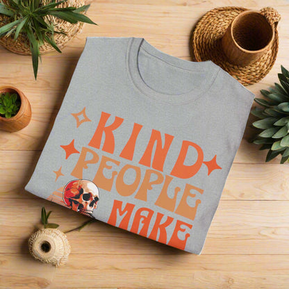 Folded gray t-shirt with orange text 'KIND PEOPLE MAKE' on a white background