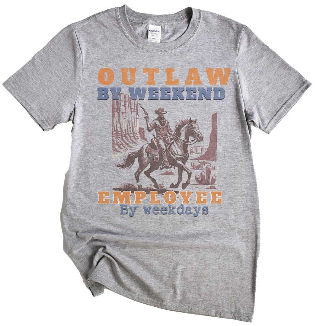 Gray t-shirt with a graphic of a cowboy on a horse and text 'Outlaw by Weekend, Employee by Weekdays' on a white background.