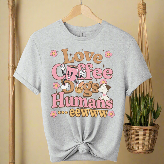 Gray t-shirt with colorful text and dog graphics on a boho background