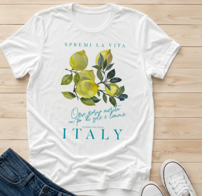 white t-shirt with a watercolor Mediterranean lemon graphic and teal Italian text reading Spremi La Vita Italy