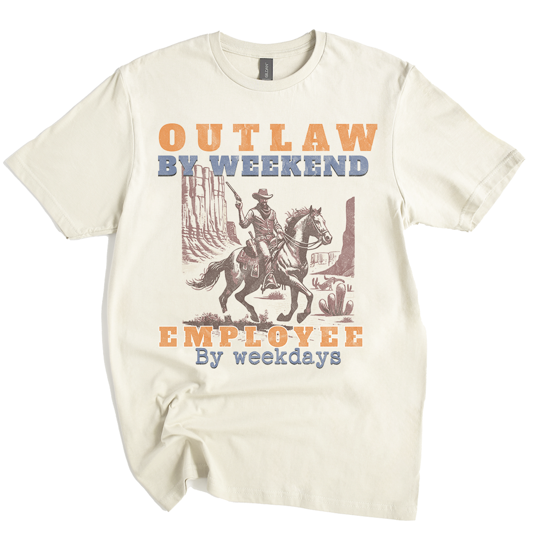 Beige t-shirt with a graphic of a cowboy on a horse and text 'Outlaw by weekend, Employee by weekdays' on a white background.