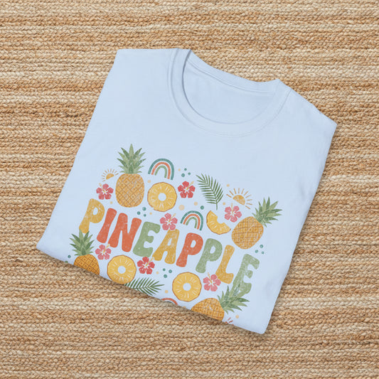 folded Light blue t-shirt with colorful pineapple design